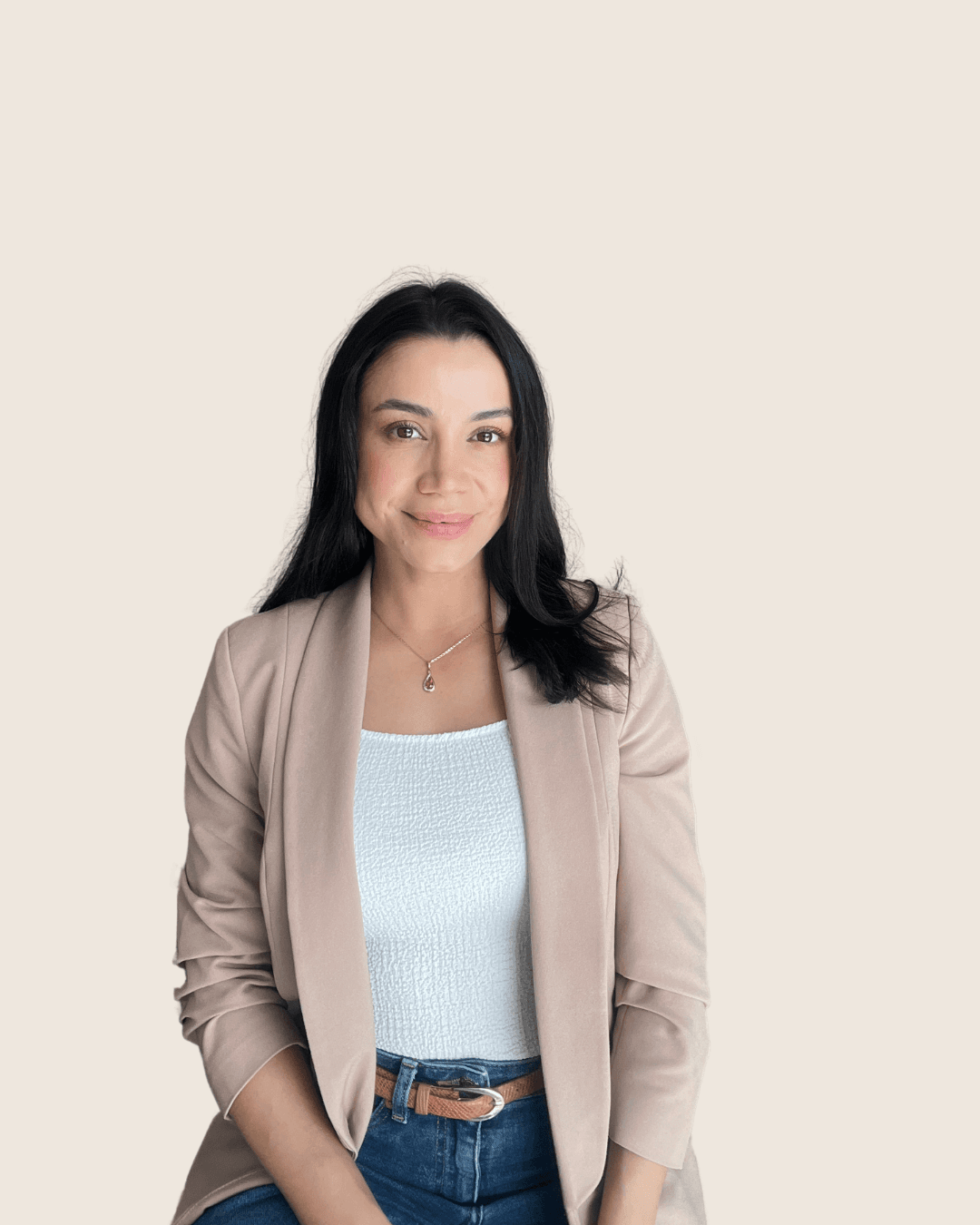 Patricia Zapata, founder of Patricia Zapata Bookkeeping, smiling in a professional portrait